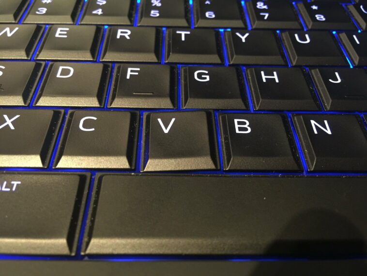 How do I know if my laptop has a backlit keyboard?